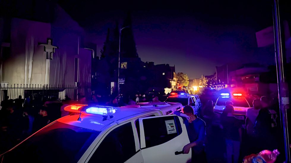 A police car outside the church