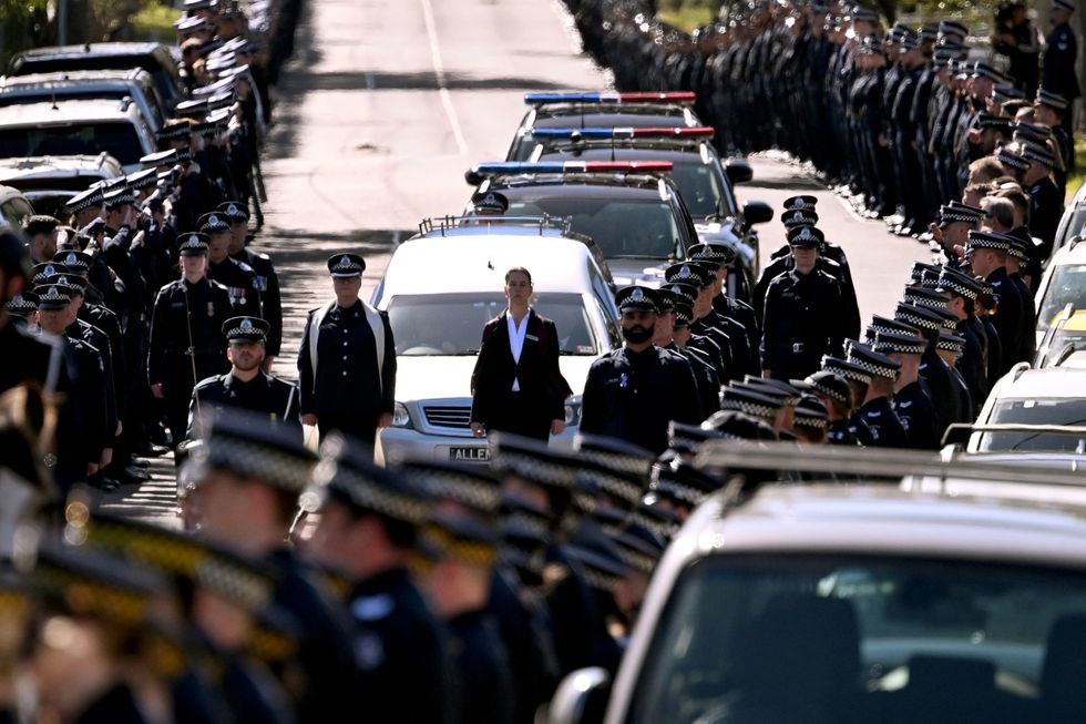 A police guard of honour for Senior Constable Vadim de Waart-Hottart