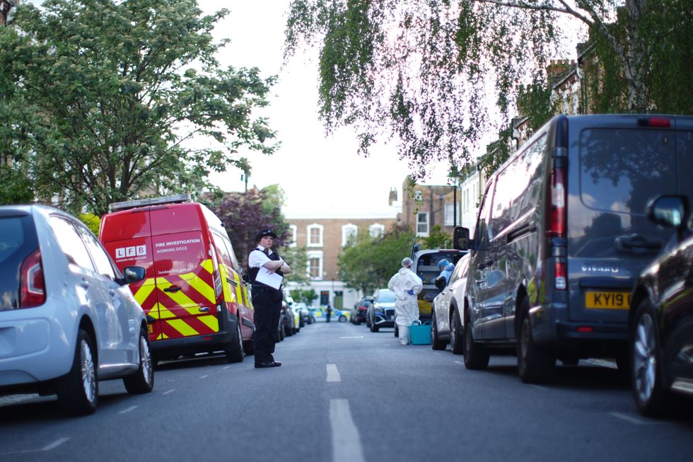 A police officer is seen in Kentish Town, north London. Police are investigating a fire at Sir Keir Starmer's house in north London