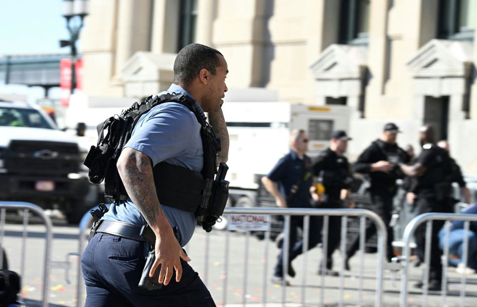 A police officer running to the scene