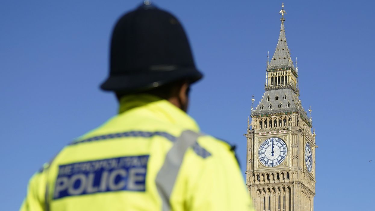 A police officer stood in front of Big Ben