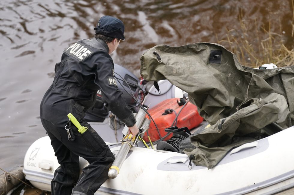 A police officer with search equipment on the River Wyre, in St Michael's on Wyre, Lancashire, as police continue their search for missing woman Nicola Bulley, 45, who was last seen on the morning of Friday January 27, when she was spotted walking her dog on a footpath by the nearby River Wyre. Picture date: Friday February 3, 2023.