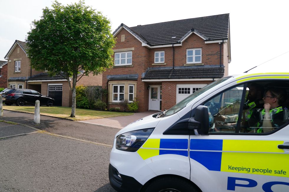 A police patrol passes the home of former first minister of Scotland Nicola Sturgeon in Uddingtson, Glasgow