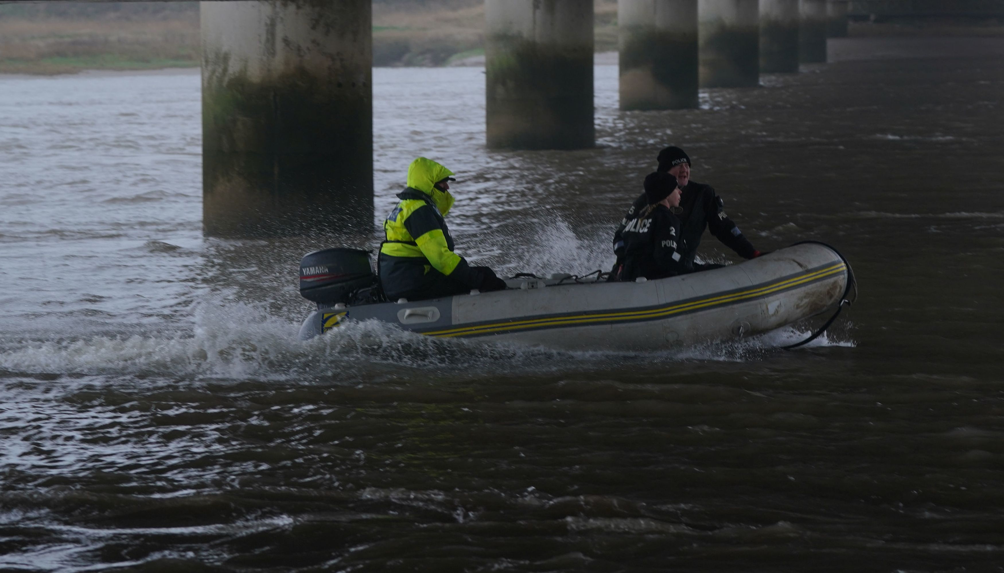 A police Search and Rescue team on the river at Shard Bridge on the River Wyre in Lancashire, as police continue their search for Nicola Bulley.