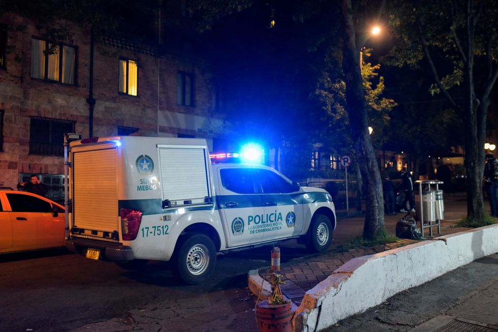 A police van is seen outside the Casa Medina hotel, where Taylor Hawkins, drummer of the band Foo Fighters was staying, who died hours before his presentation at the Estereo Picnic festival, in Bogota, Colombia, March 25, 2022. REUTERS/Mariano Vimos