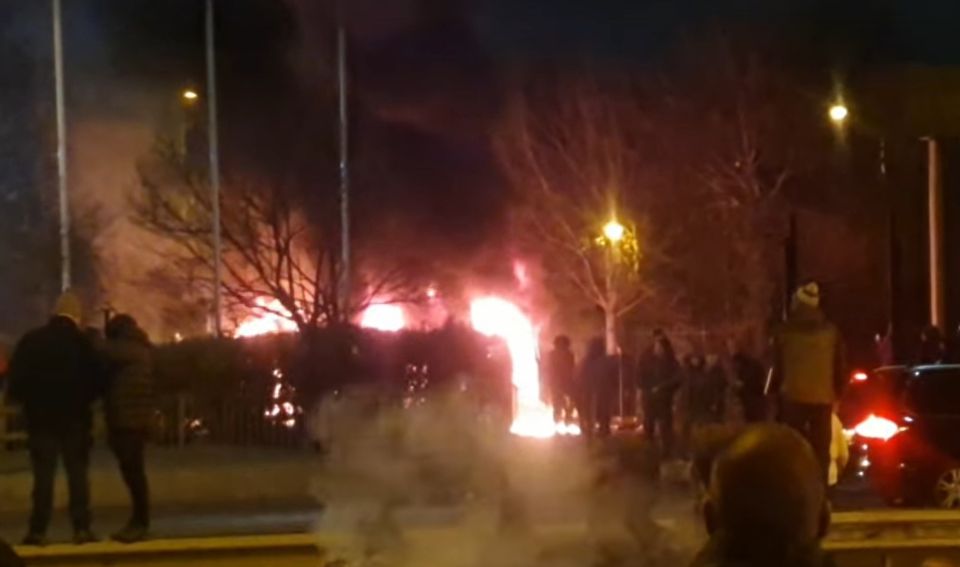 A police van was set alight as officers attended in riot gear to restore calm