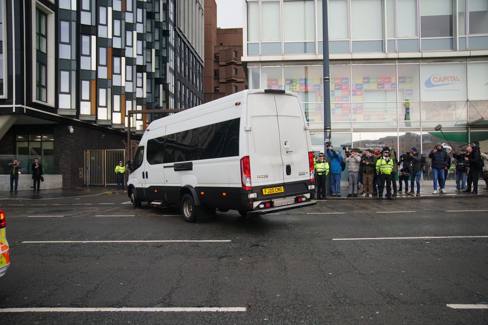 A prison van thought to contain Rudakubana arrives at the court