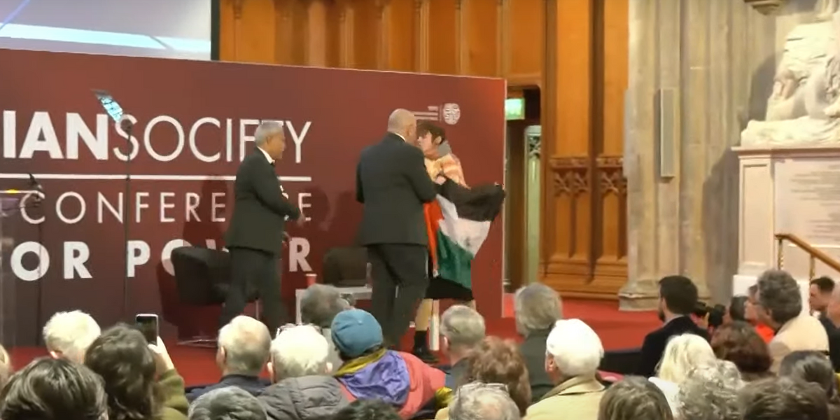 NextImg:Pro-Palestine protesters ejected after storming stage and heckling as David Lammy addresses Israel-Hamas ceasefire