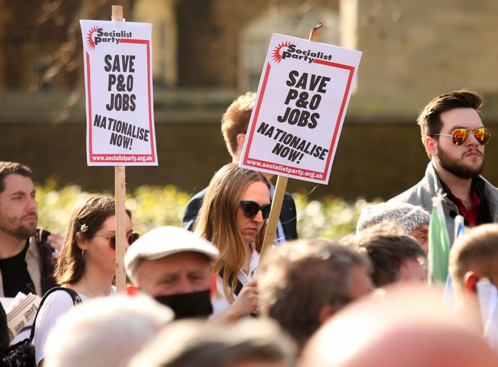 A protest by unions outside the Houses of Parliament, London, over P&O Ferries handing 800 seafarers immediate severance notices last week. Picture date: Monday March 21, 2022.