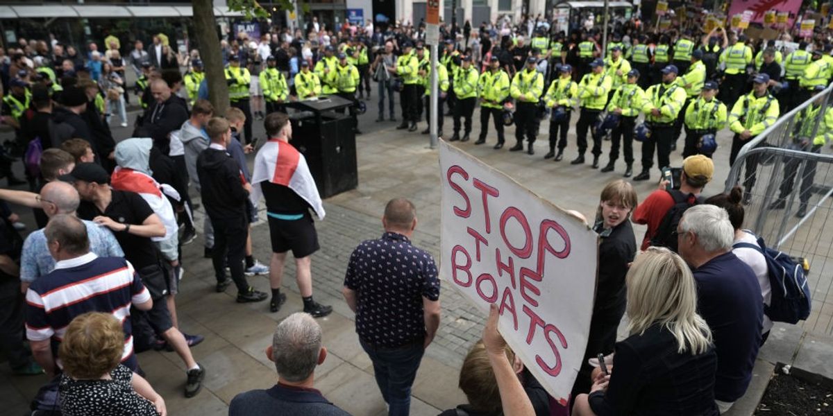 NextImg:Chants of 'England till I die' as protesters and counter protesters take to the streets in Manchester
