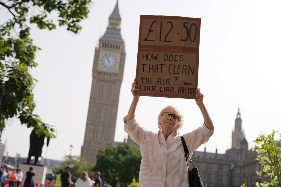 A protester holding up a sign