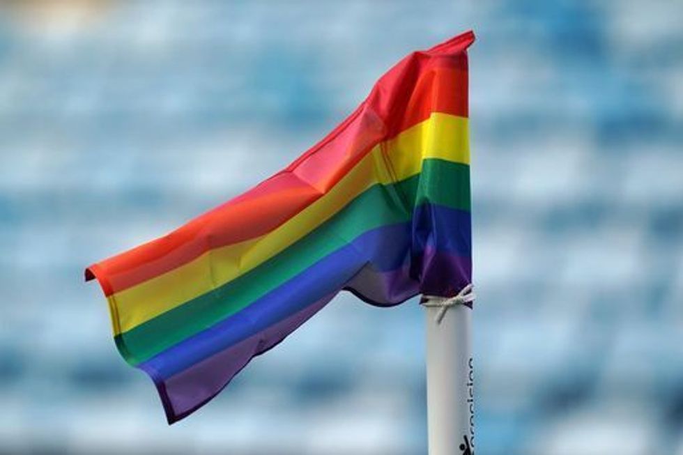 A rainbow coloured flag is support of the Stonewall Rainbow Laces campaign