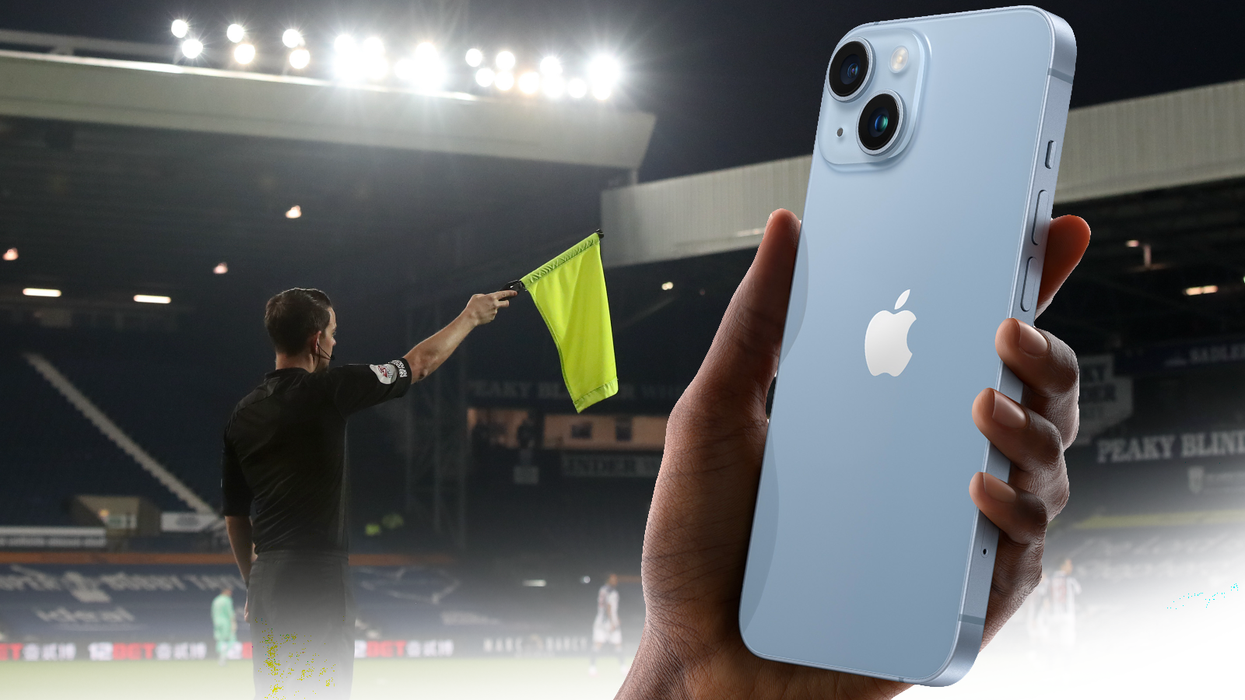a referee holding up the offside flag with a superimposed picture of an iphone in the foreground
