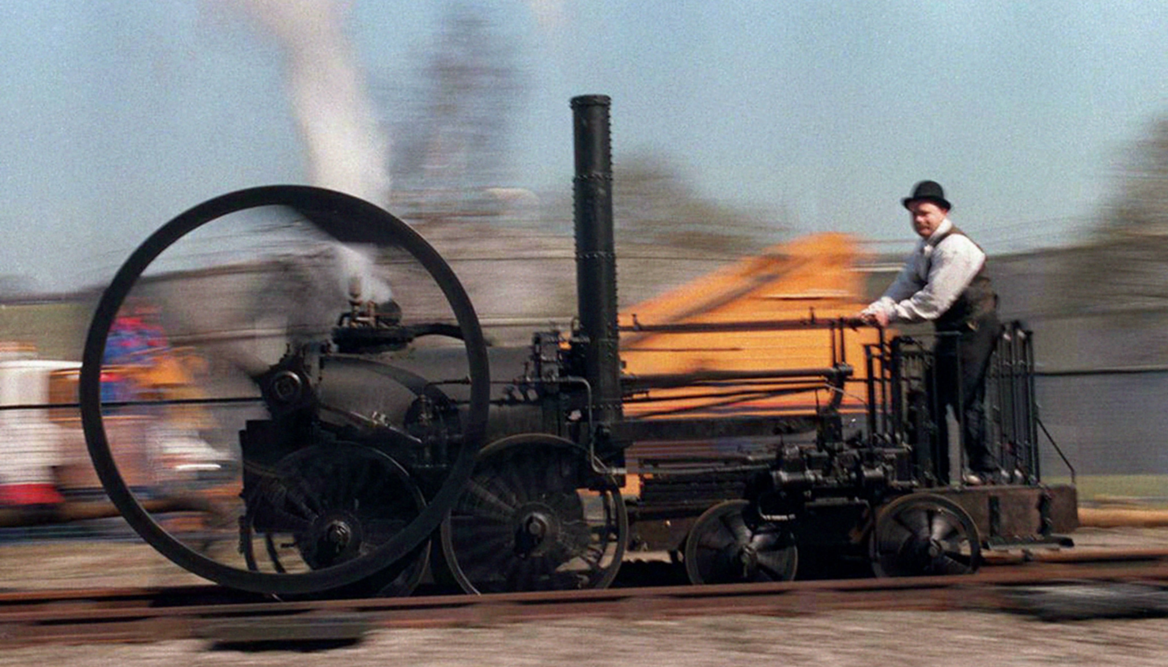 A replica of Richard Trevithick's 1802 steam engine, the world's first steam railway locomotive runs on a track near the Ironbridge power station.