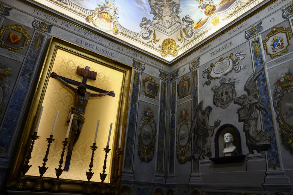 A restored angel fresco is displayed inside the Basilica of St. Lawrence\u200b
