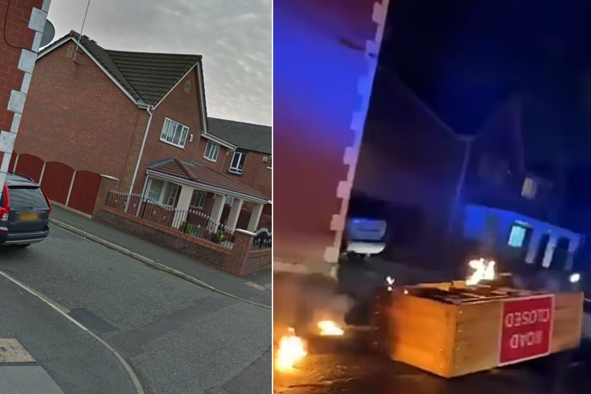 ​A road block on a road in Rochdale set on fire