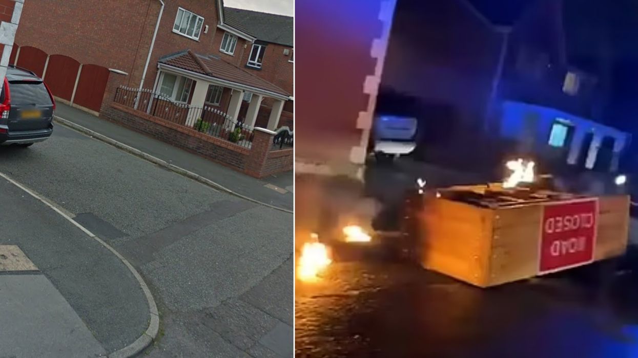 A road block on a road in Rochdale set on fire