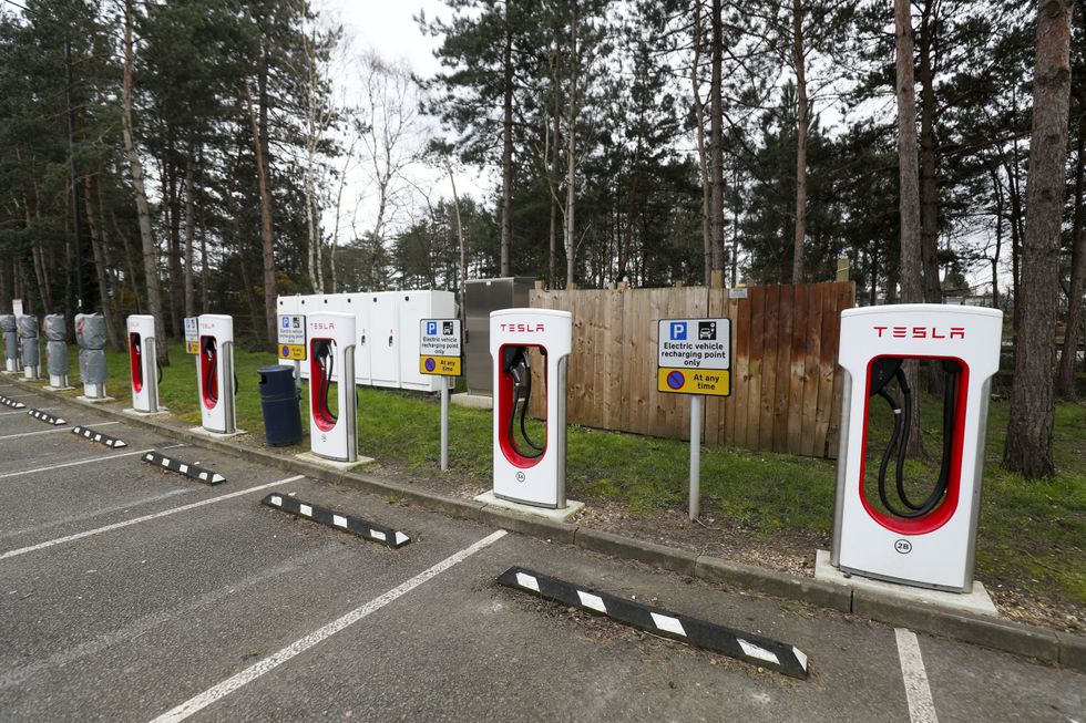 A row of Tesla Superchargers