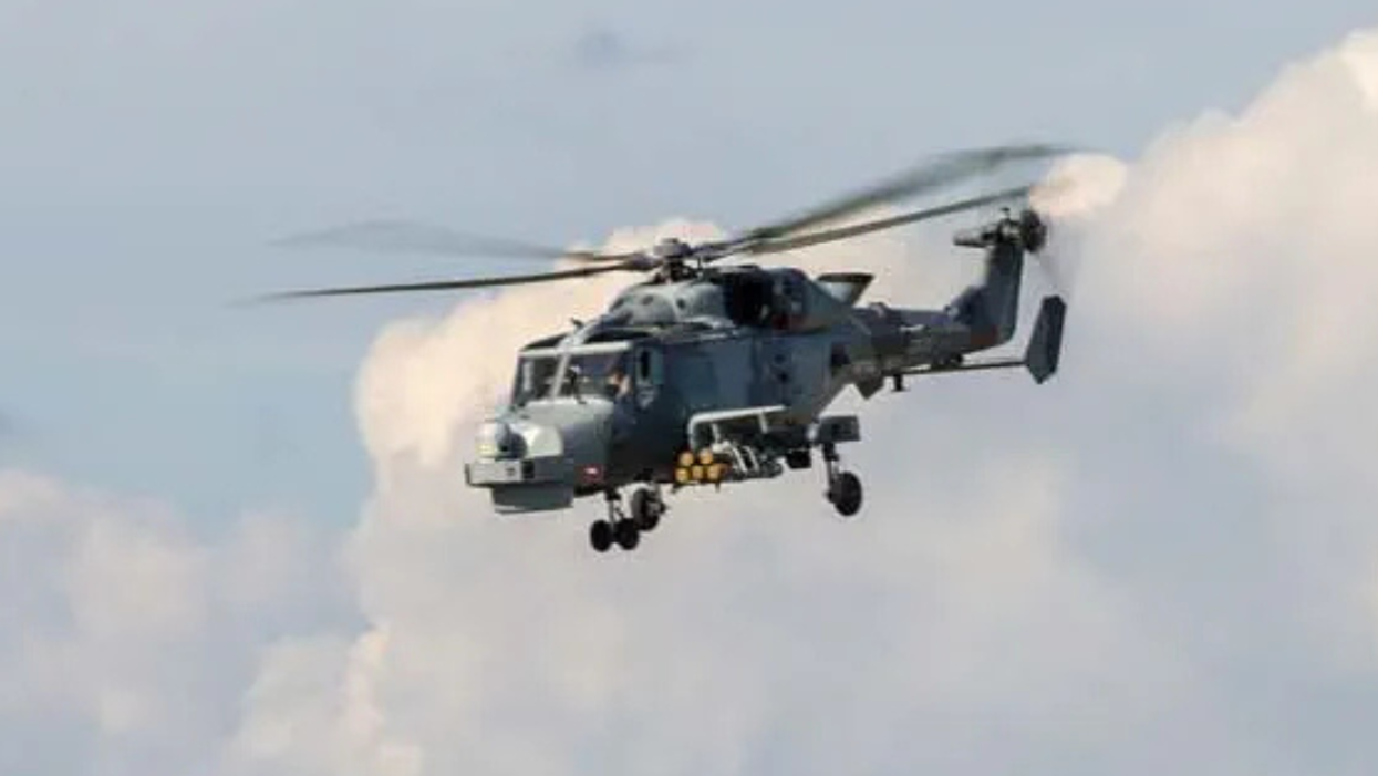 A Royal Navy Wildcat helicopter airborne