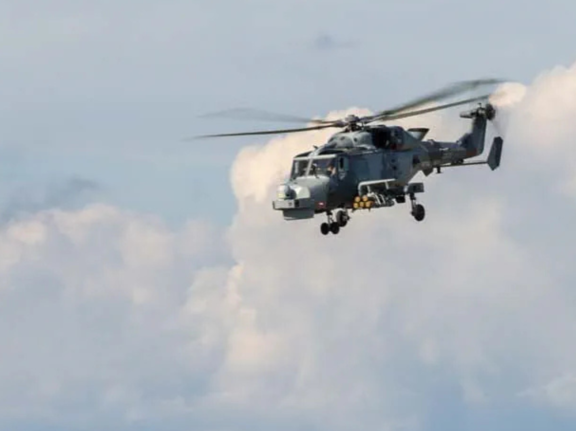 A Royal Navy Wildcat helicopter airborne