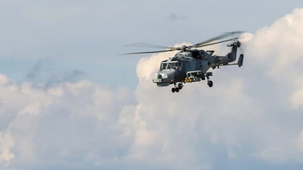 A Royal Navy Wildcat helicopter airborne