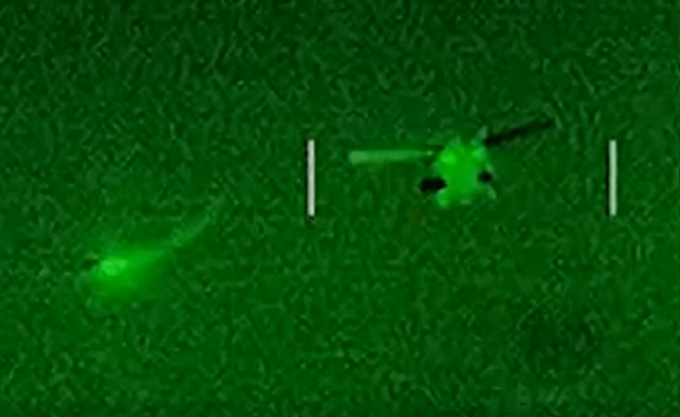 A Royal Navy Wildcat helicopter firing its new anti-drone missile system