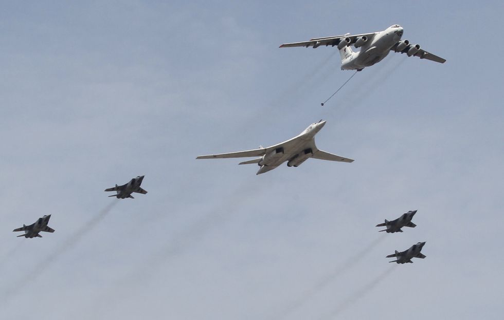 A Russian Tupolev TU-160 jet bomber fly over Red Square