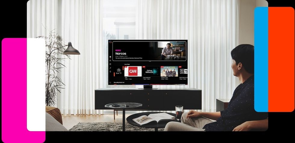 a samsung smart tv viewer watches tv plus