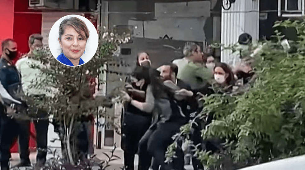 A screengrab from a video filmed in October 2022 shows female protesters being roughly handled by Iranian security forces in Gilan provinc