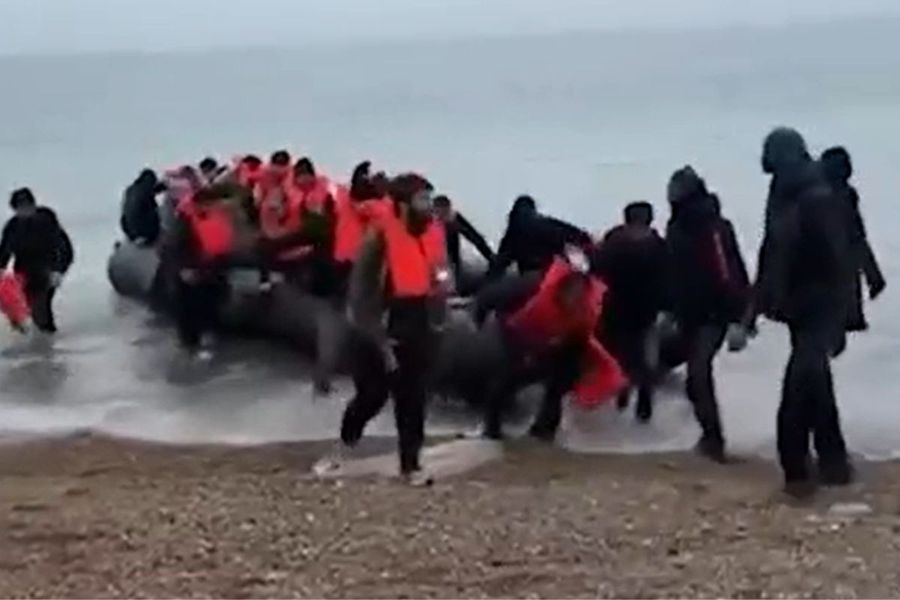 A screengrab of migrants departing France in a small boat