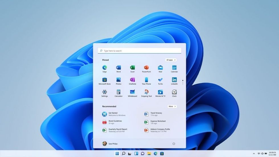 a screenshot from windows 11 showing the Start Menu in its new location in the middle of the screen