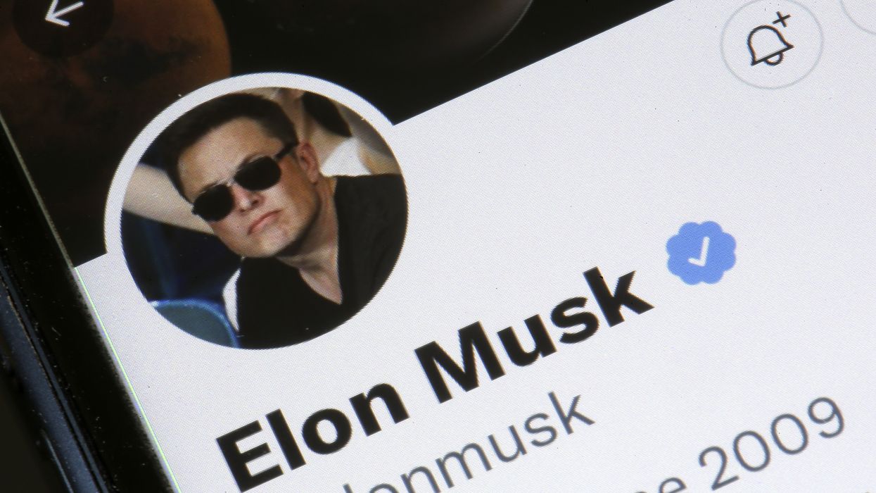 a screenshot of elon musks profile on x shown on a smartphone screen