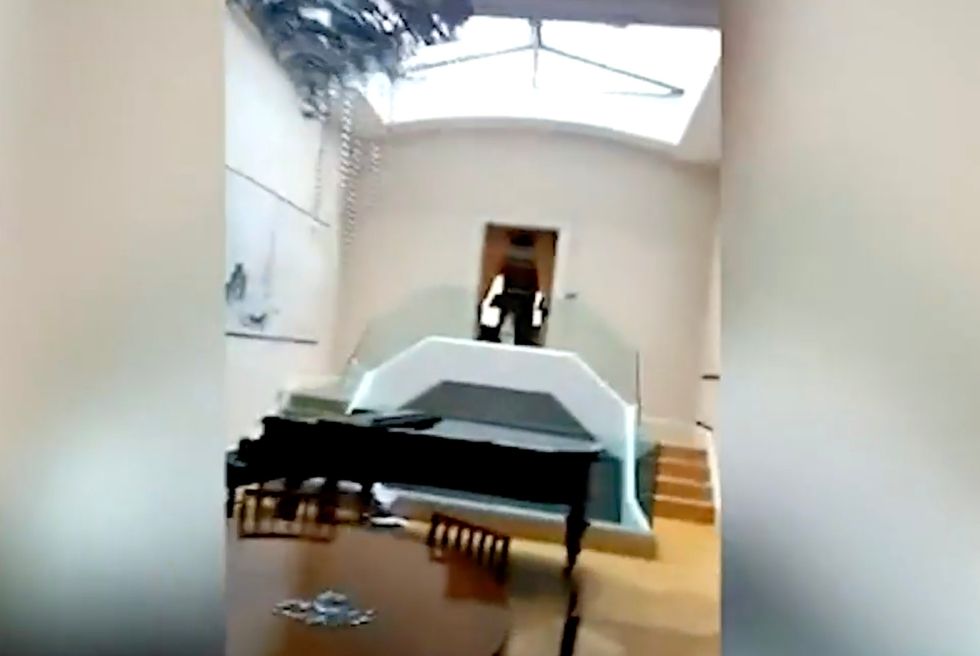 A screenshot of the video squatters took inside the oligarch's home shows a grand piano