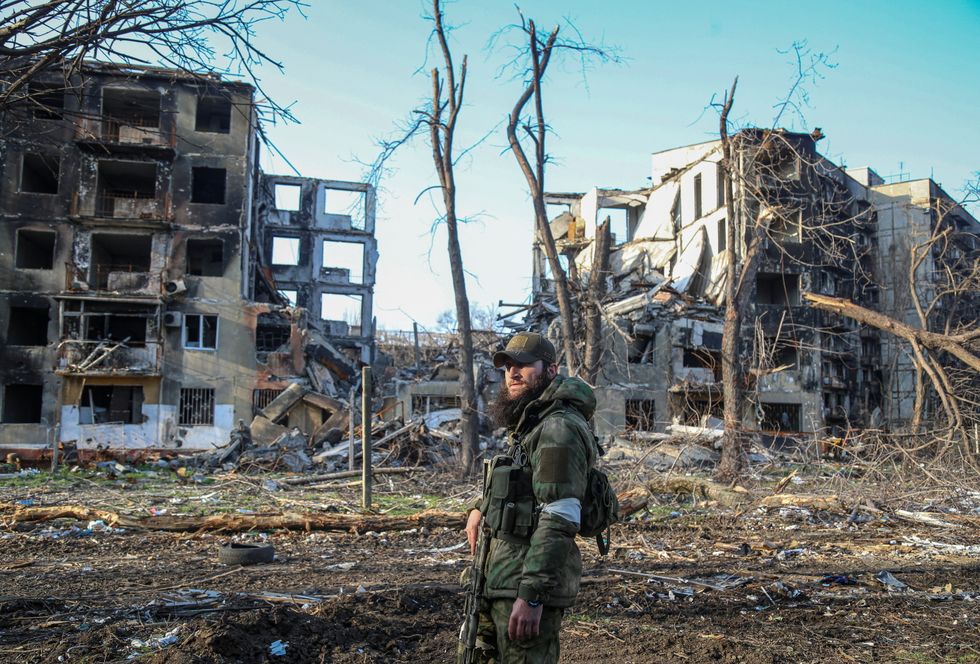 A service member from Chechen Republic looks on during fighting in Ukraine-Russia conflict in the city of Mariupol.