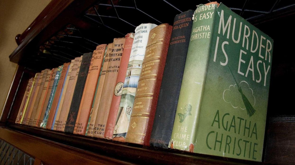 A shelf with Agatha Christie novels on