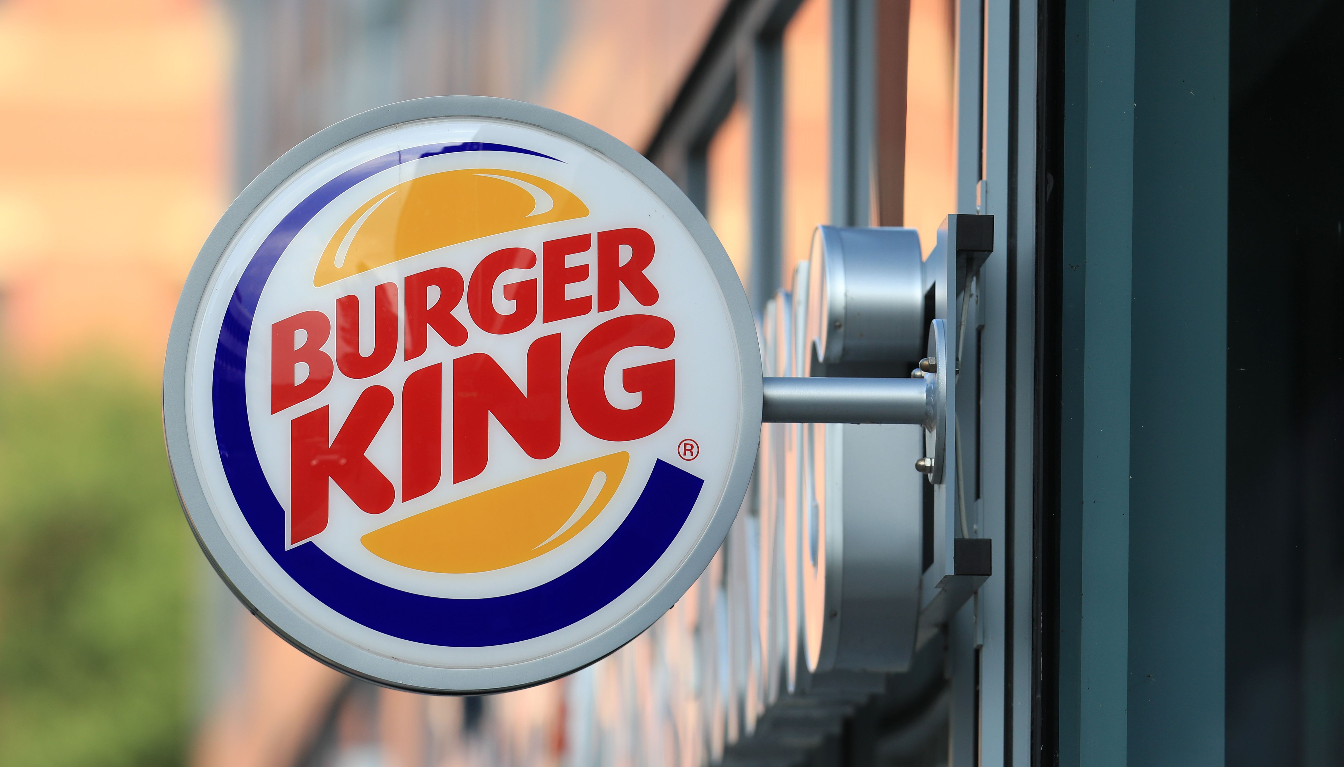 A shop sign for Burger King in Leeds.