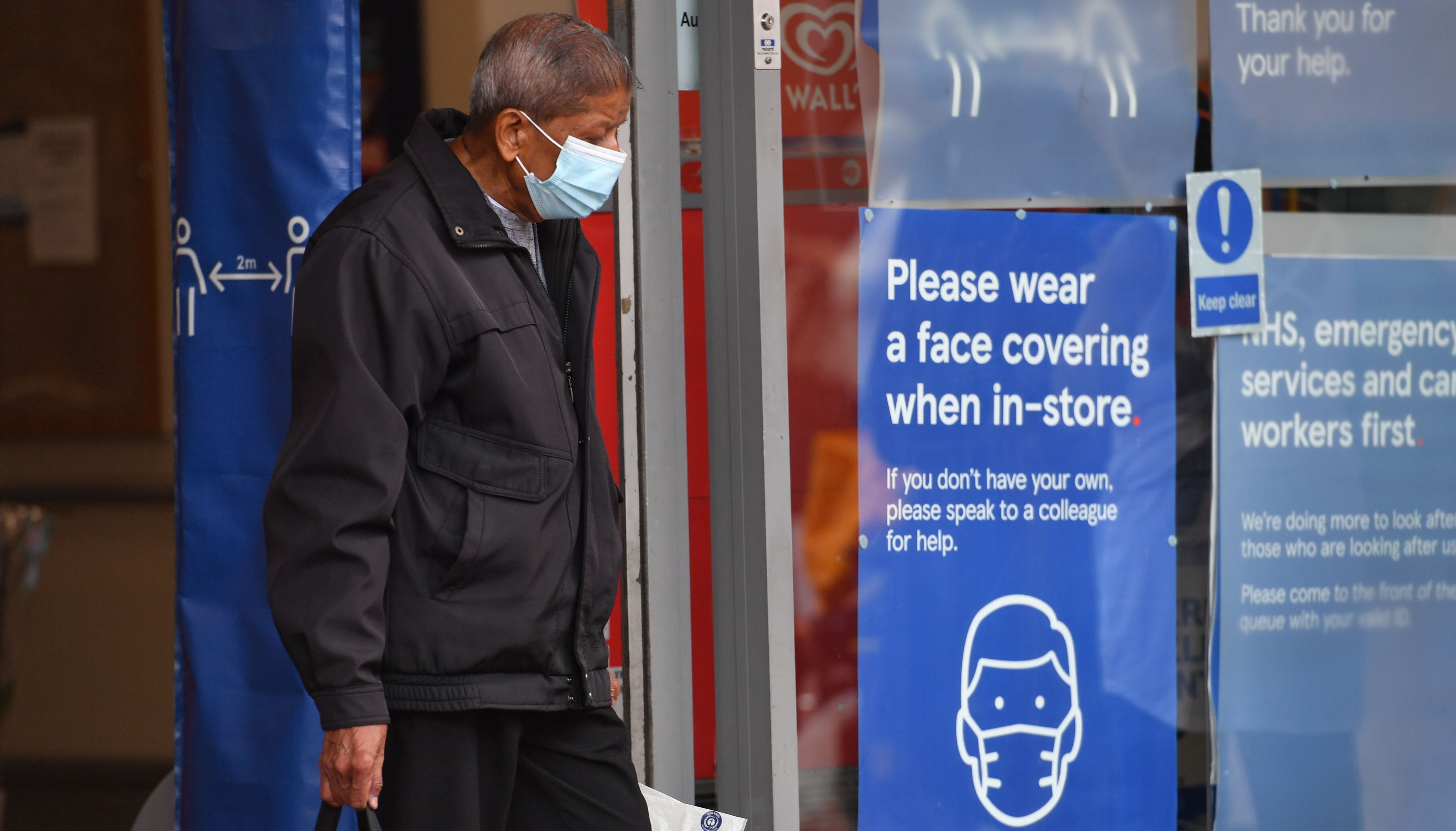 A shopper wearing a face mask