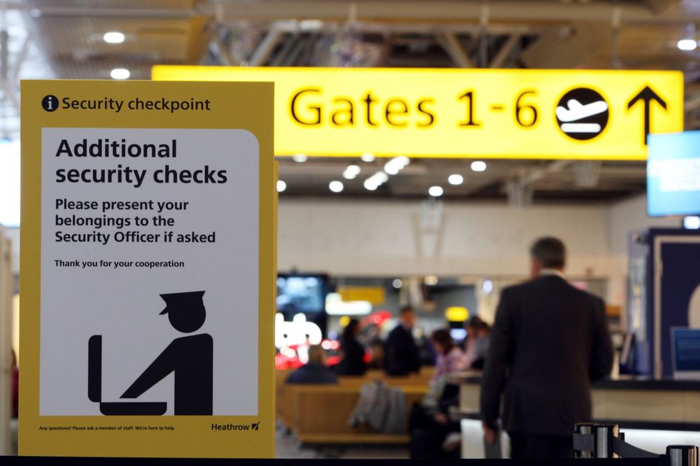A sign by the new scanners at Heathrow Airport in Middlesex