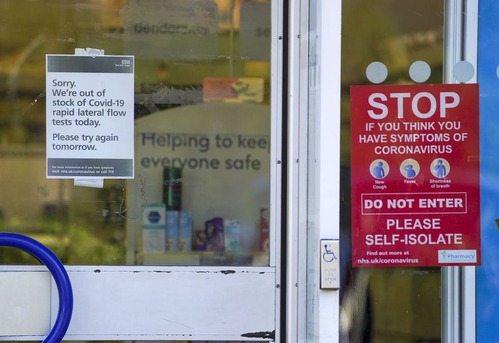 A sign informing customers that there are no lateral flow test (LFT) kits available on the door of a Boots Pharmacy in Bracknell, Berkshire. The UK Health Security Agency have said people in England without coronavirus symptoms who have a positive lateral flow test will no longer need a confirmatory PCR test from January 11. Picture date: Wednesday January 5, 2022.