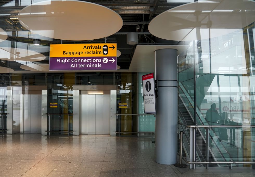 A sign informs passengers on their arrival in Terminal 5 at Heathrow Airport in west London ahead of international travel restarting on Monday May 17, following the further easing of lockdown restrictions. Picture date: Thursday May 13, 2021.