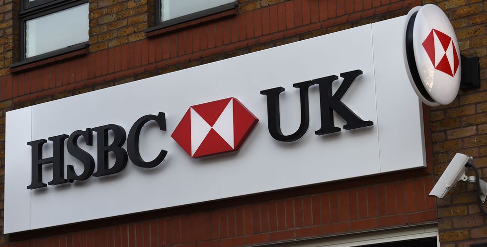 A sign on a branch of HSBC in Tooting Broadway, London, as nearly 400 jobs are at risk after the high street lender revealed plans to slash its IT staff and shut a further 62 bank branches on top of the 55 closures announced last year.
