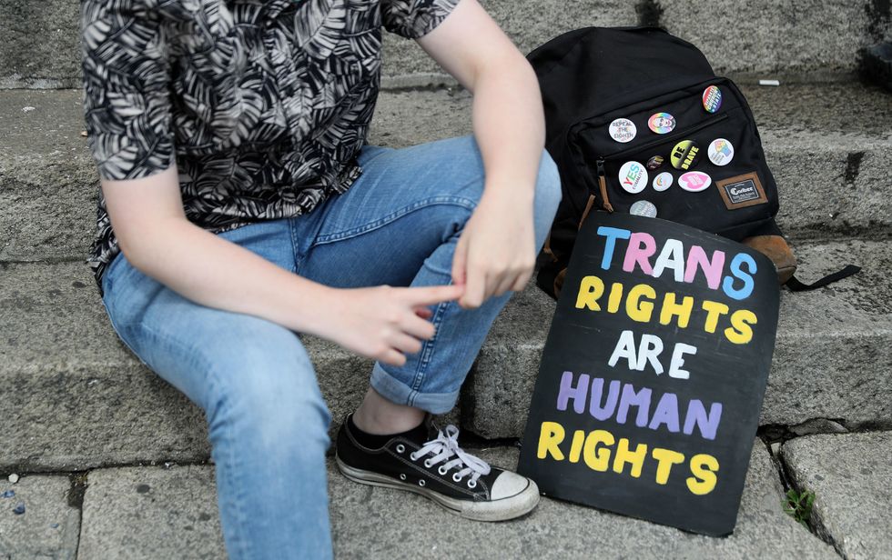 A sign saying "trans rights are human rights"
