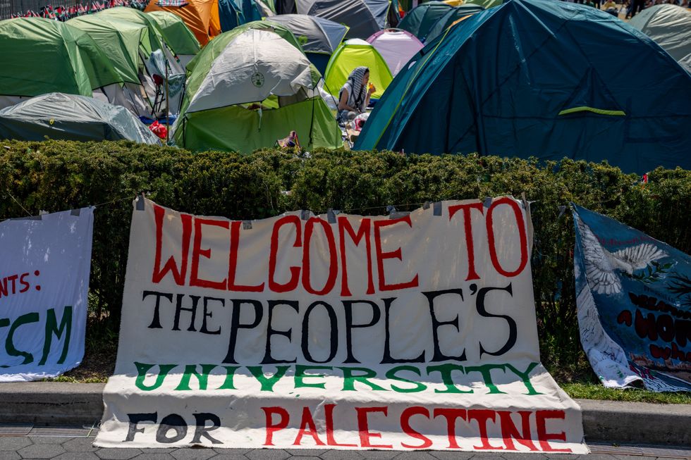 A sign saying "Welcome to the People's University for Palestine"