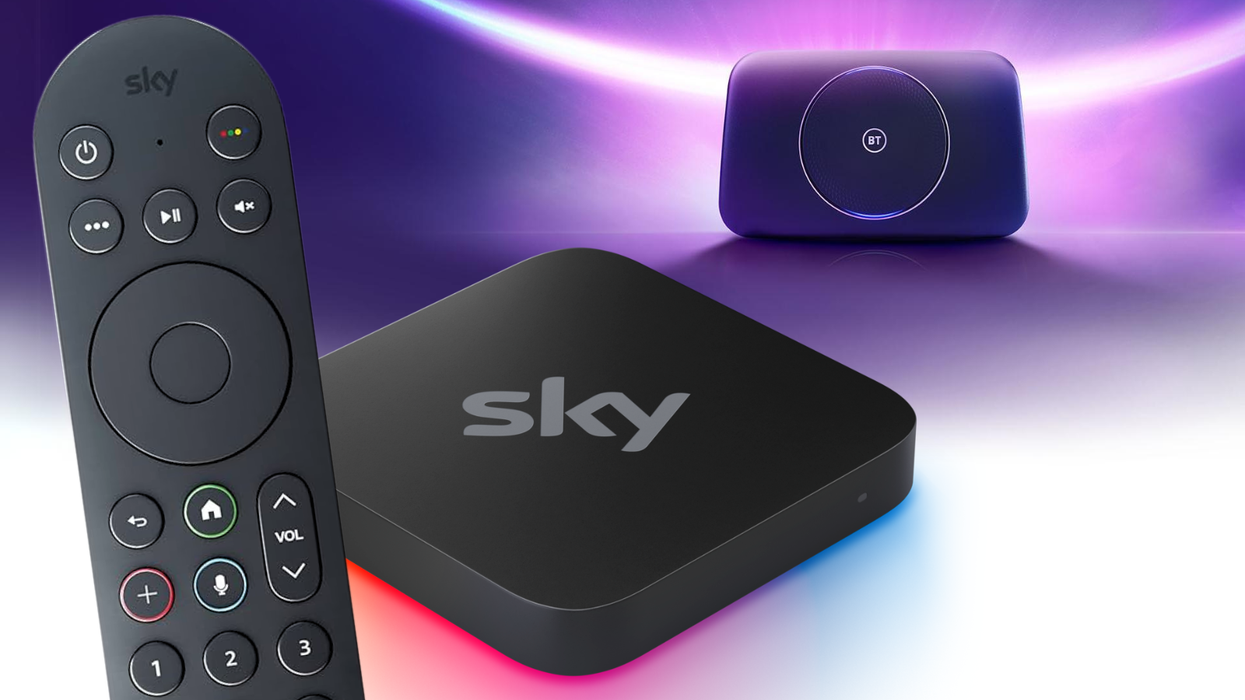 a sky stream remote control is pictured infront of the new sky stream box while a bt broadband router can be seen in the background