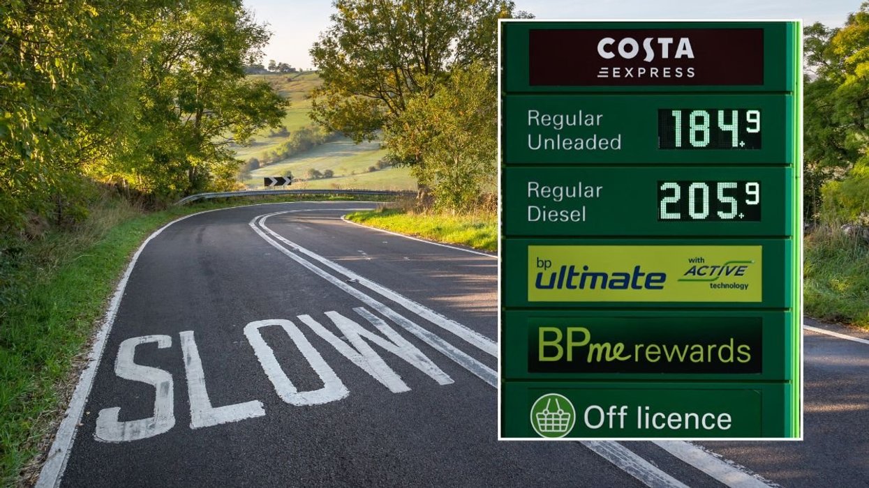 A slow sign on a rural road and expensive fuel prices