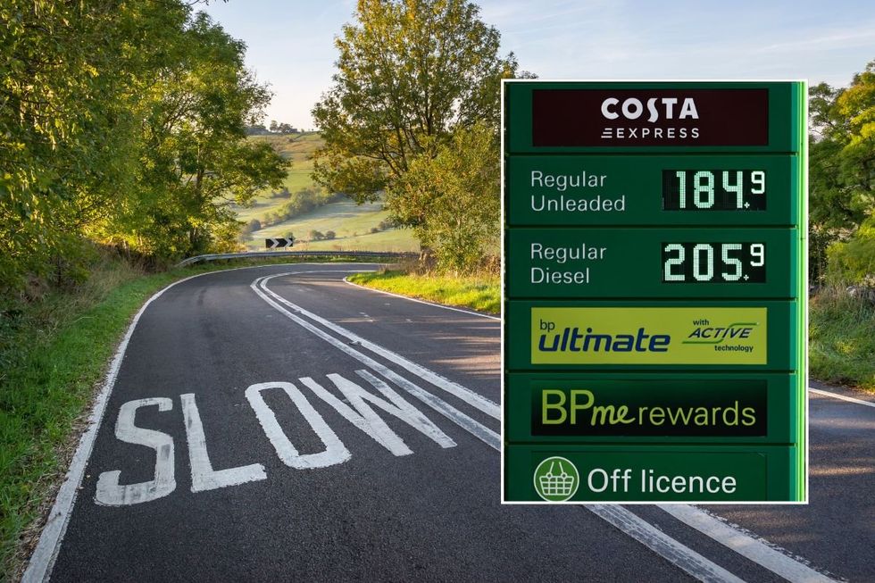 A slow sign on a rural road and expensive fuel prices