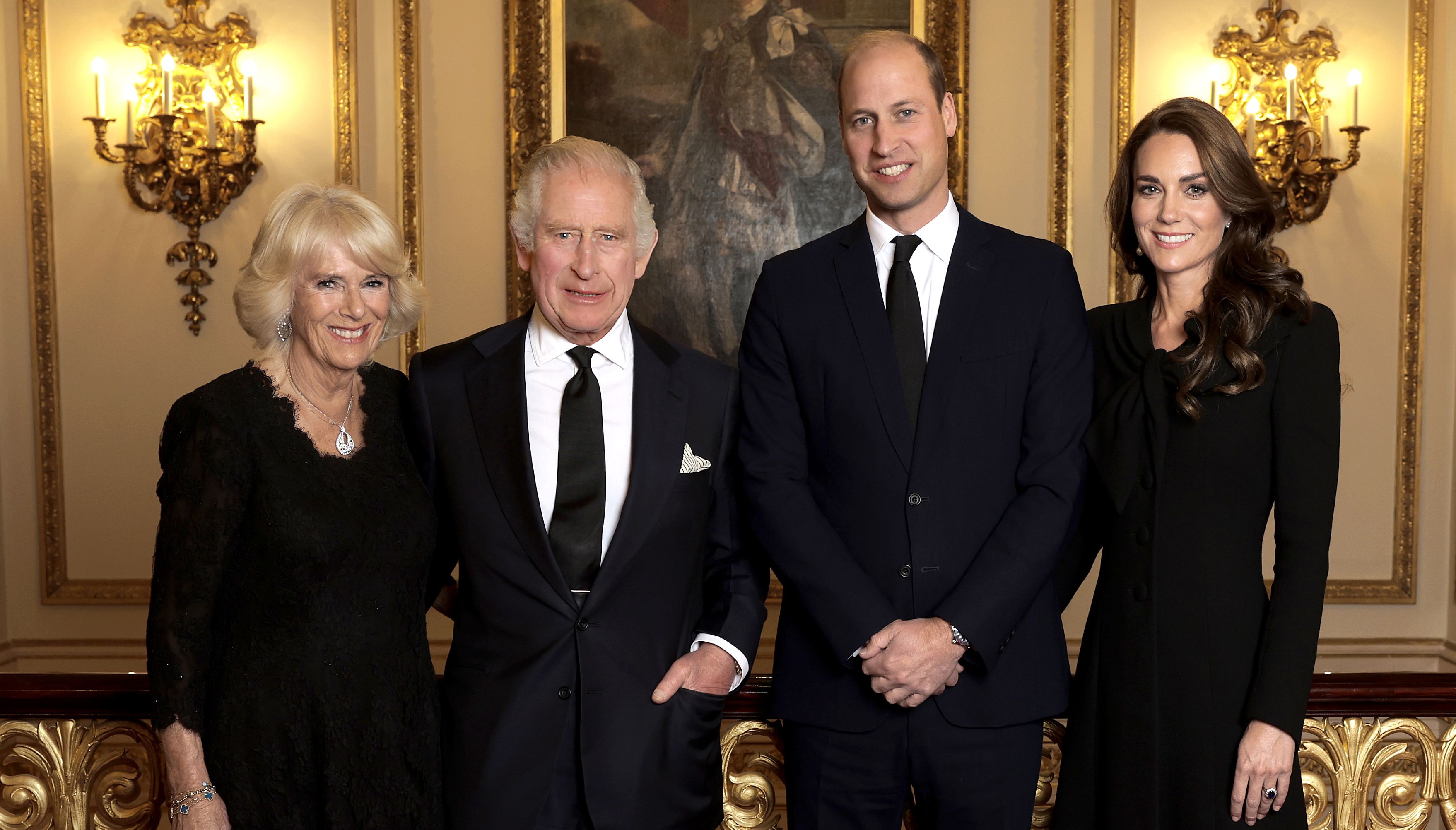 A smiling family portrait of the King, his son who is the first in line to the throne and their wives has been released by Buckingham Palace.