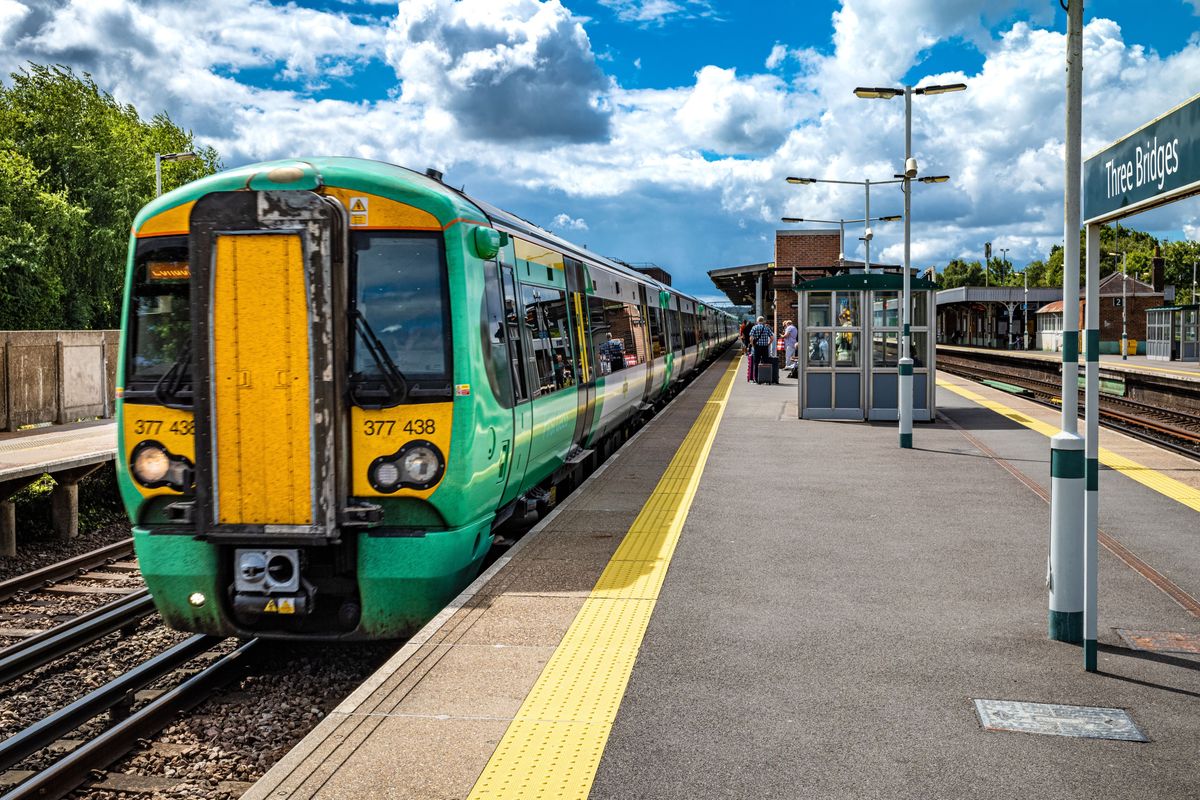 A Southern Railway train pulls into Three Bridges Railway Station
