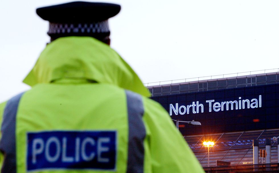 A stock image of a police officer outside Gatwick Airport