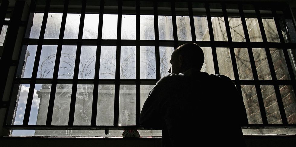 A stock image of a prisoner
